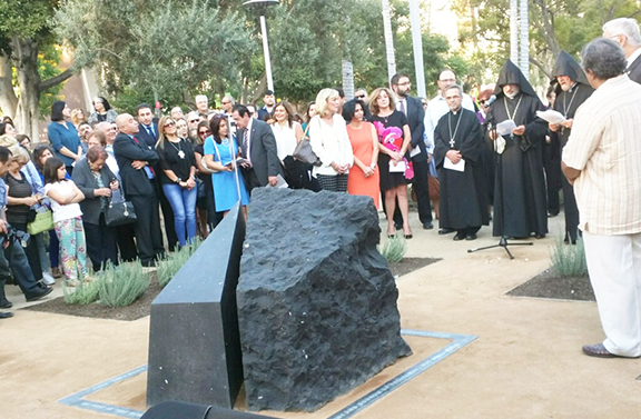Clergy and organizers gathered after the unveiling of the Armenian Genocide Monument at Grand Park in Los Angeles